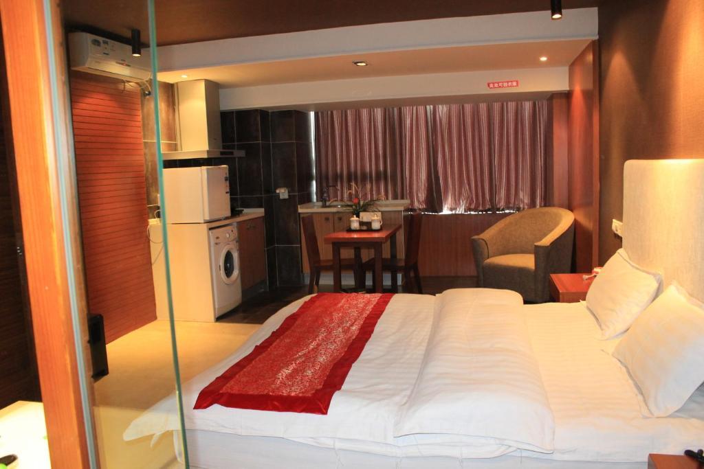 Chengdu Comma Apartment Hotel - Xinian Branch الغرفة الصورة